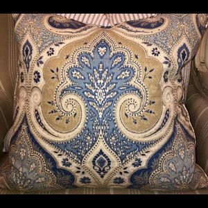 Two blue and tan pillow covers.